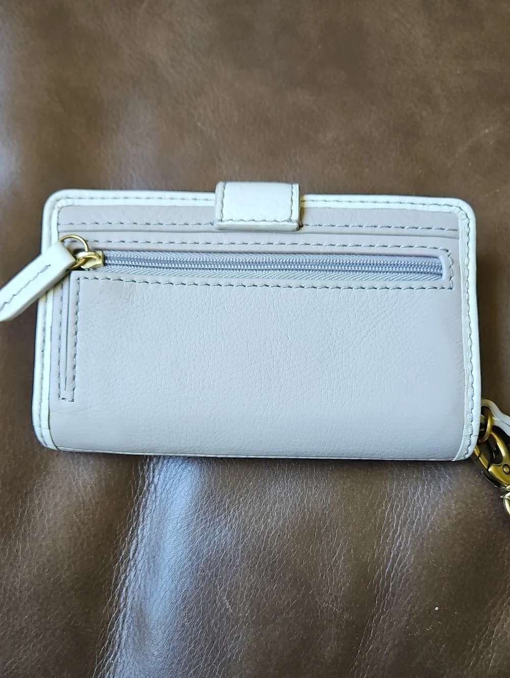 Fossil Emerson SWL1316 Laser-Cut Leather Bifold Wristlet Wallet Cream Taupe